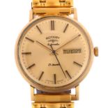 ROTARY - a 9ct gold automatic calendar bracelet watch, champagne dial with applied baton hour