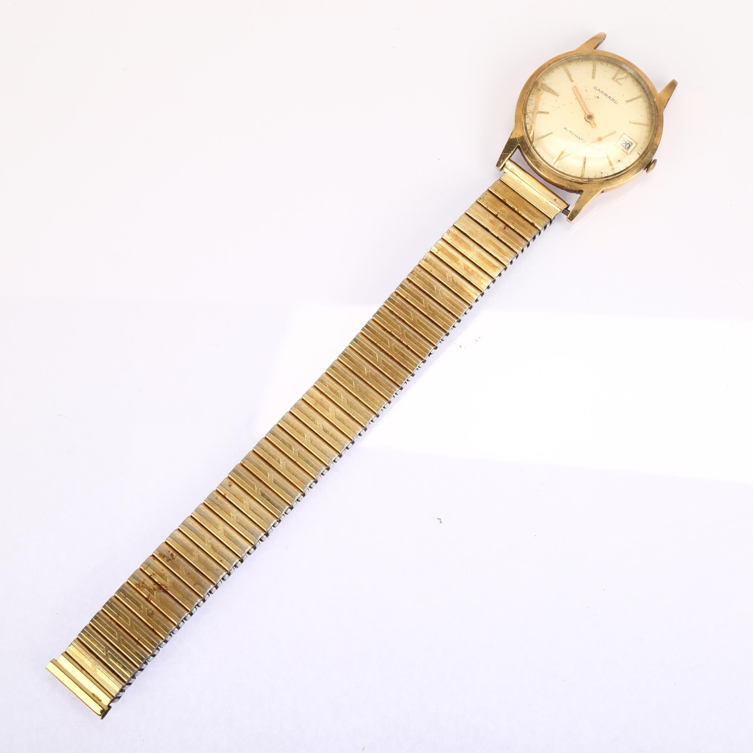 GARRARD - a 9ct gold automatic wristwatch, silvered dial with applied gilt baton hour markers and - Bild 2 aus 5