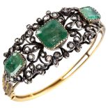 A fine Victorian emerald and diamond hinged bangle, unmarked gold and silver-topped openwork