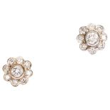 A pair of diamond flowerhead cluster earrings, unmarked 18ct white gold settings with modern round