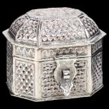 An Indian silver casket trinket box, octagonal dome-top form with pierced and relief embossed floral