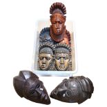 A group of various carved wood African Tribal masks, tourist pieces (7)