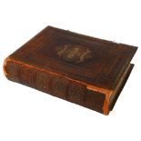A Victorian Brown's Self Interpreting family Bible, with gilded tooled leather bindings and embossed