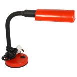 An orange flexible gooseneck table lamp, previously manufactured by BHS Lighting, stamp and