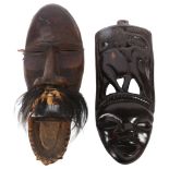 A West African carved face mask, L36cm, and another (2)