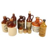 A group of stoneware beer and cider bottles, including Fryco, 18cm