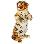 Capodimonte, a large ceramic snarling tiger, maker's mark to the bottom, H56cm