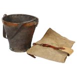 A 19th century leather steel and copper-bound fire bucket, with leather handle, diameter 28cm,