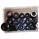 A quantity of various camera lenses, including such brand names as Tamron, Miranda, Chinon etc