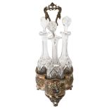 A 19th century electroplate and cut-glass 3-bottle decanter stand, height 46cm Plating is worn/