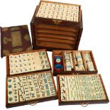 A Chinese ivorine Mahjong set, in a fitted 5-drawer chest with stylised engraved brass mounts,