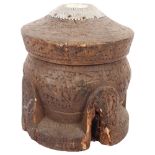 A large Tunisian carved hardwood coffee grinder, H31cm