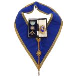 A silver-gilt blue enamel Masonic medallion for Northumberland with matching silk sash, a silver