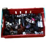 A quantity of various cameras and associated equipment, including a Praktica TL100, a Chinon CM-