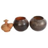 An Archaic style terracotta water vessel, and a pair of terracotta bowls with incised decoration