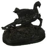 A black patinated spelter group of a pheasant and branch, after Moler, on naturalistic base, L33cm