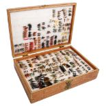 A large collection of Vintage and other fishing flies, double-cased