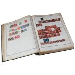 A partial album of UK and world stamps, including a One Penny Black, unperforated, no margins,