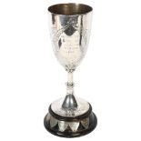 A mid-century engraved silver plated trophy, on turned wood stand, stand set with silver named