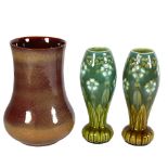 A Pilkington Lancastrian vase, height 20cm, and a pair of Art Nouveau vases, 1 A/F (3)