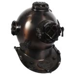 A reproduction US Navy diving helmet, Mark V, with the narrative Moore's Diving Equipment Company