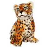 A ceramic juvenile leopard, stamped to the underside, 'Hand painted made in Italy', no other maker's