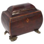 A walnut sarcophagus tea caddy, 2 inner fitted lids, on cast brass feet, W21cm