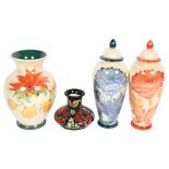 Lise B. Moorcroft, a pair of lustre baluster vases and covers, a similar vase of waisted form, and a