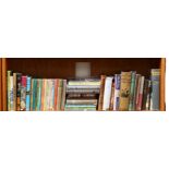 A shelf of hardback novels, and children's books including Vintage Ladybird books