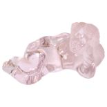 Daum, France, glass paperweight in the form of a reclining cherub Good overall condition, some light
