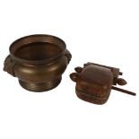 A Chinese bronze censer with dog of fo handles, 23cm across overall, and a Tibetan wooden drum