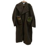 An Army Great coat 1951 pattern, size 8, height 5'9" - 5'10", 2 pairs of canvas and leather spats