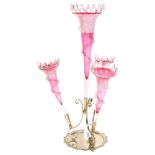 A cranberry glass and silver plated table epergne, with 4 shaped trumpets, H58cm Good overall