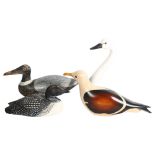 A carved and painted wood duck decoy, a carved and painted wood swan, and 2 others (4)