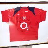 A framed Arsenal Squad signed shirt, 2006, including Tierry Henri, Sol Campbell, and Dennis Bergkamp