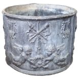 An embossed circular lead planter, with cherub decoration, diameter 34cm, height 25.5cm