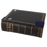 Leather-bound illustrated family Bible, published by Cassell, with bookmark