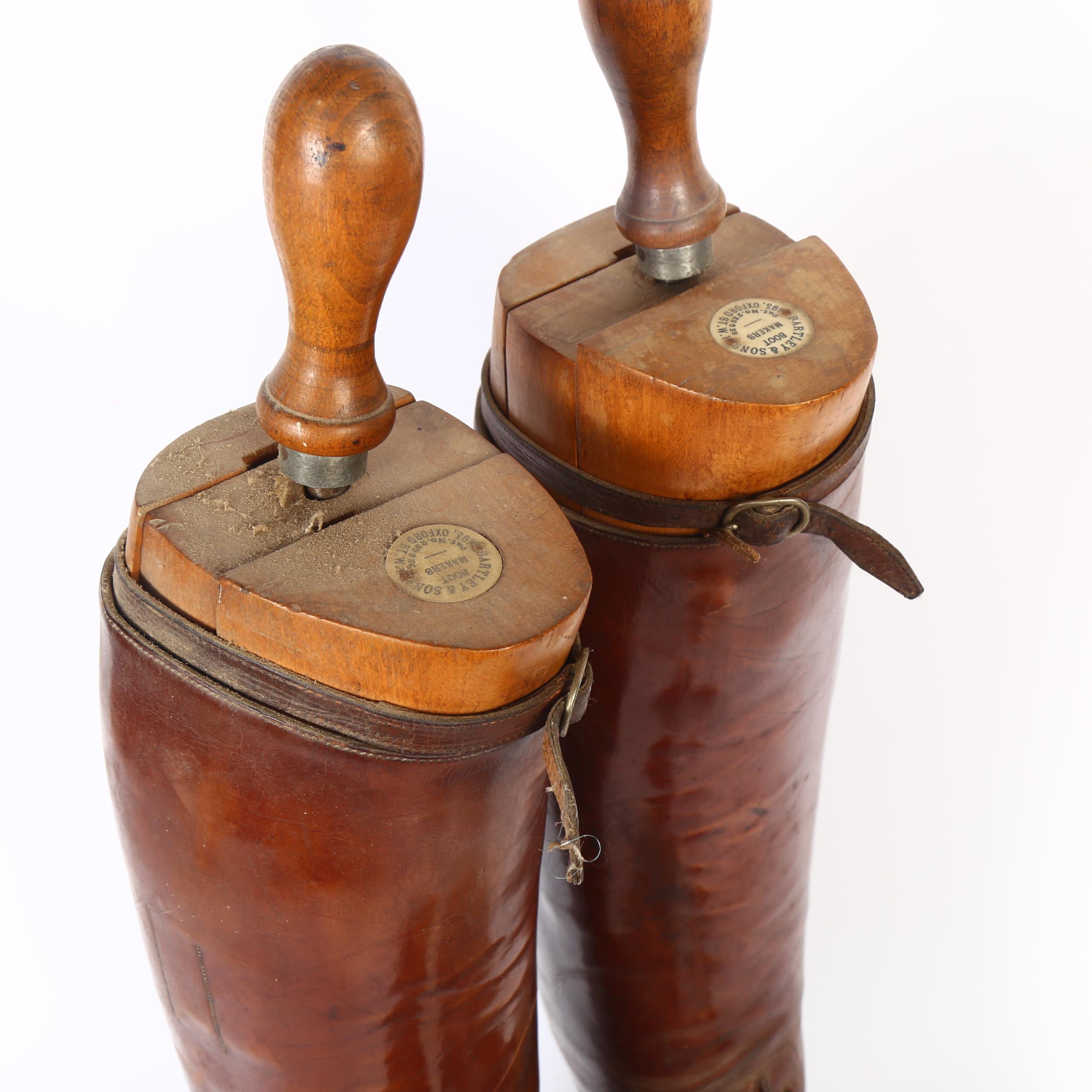 A pair of early 20th century brown leather military riding boots and trees, boot height 49cm approx, - Image 2 of 2