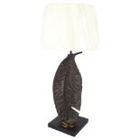 A contemporary cast-metal lamp in the form of a feather, with LED bulb, and shade, H74cm