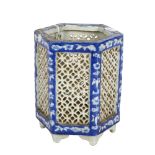 A Chinese blue and white octagonal jardiniere, with pierced fretwork panels, overall diameter