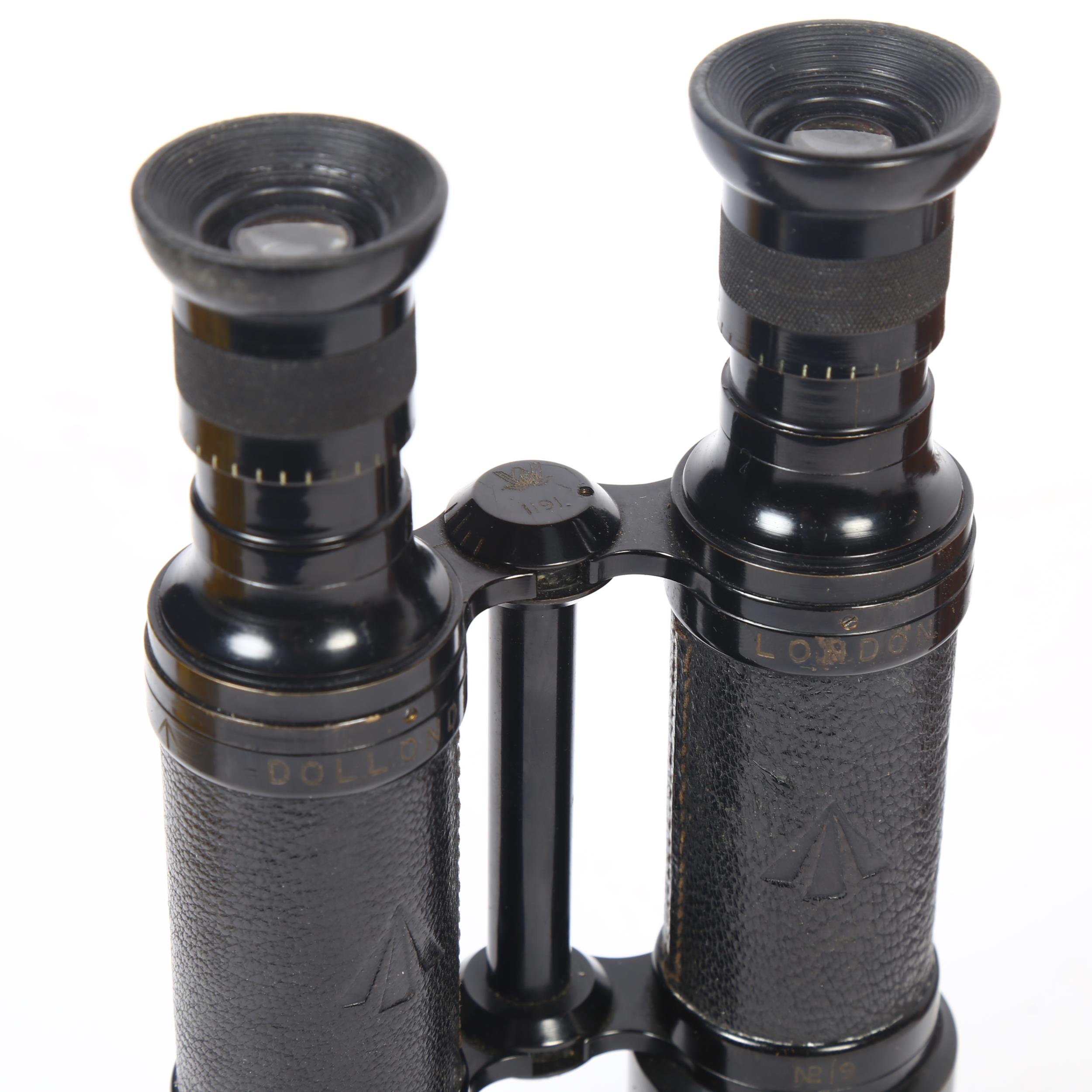 DOLLOND, LONDON - a pair of inverted military binoculars, with military ciphers, marked N219 and - Image 2 of 2