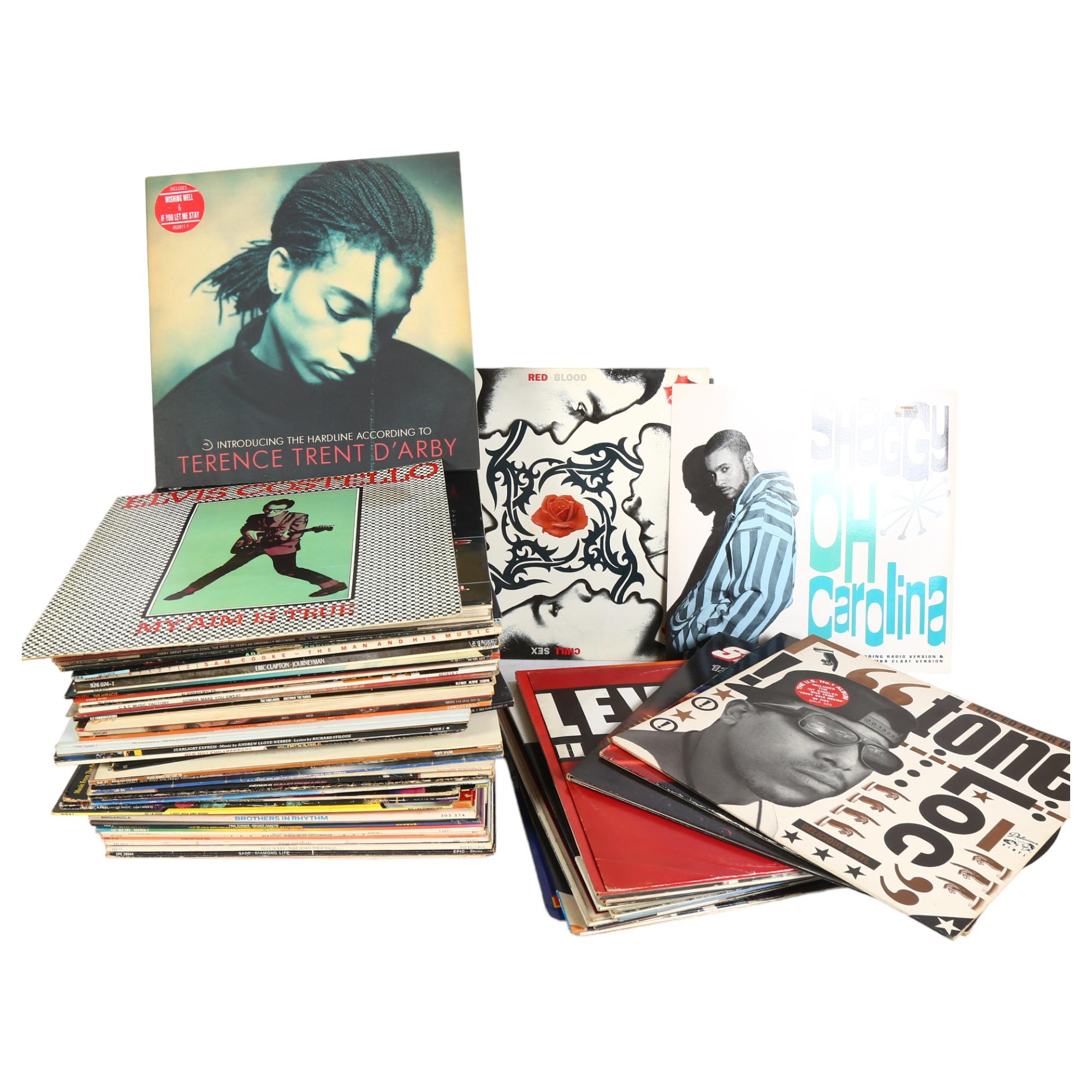 A quantity of vinyl LPs and 12" singles, including such artists as Queen, Fairground Attraction,