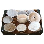 A box of Antique and Vintage ceramic jelly moulds