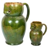 2 Farnham pottery earthenware owl jugs, green glaze with incised decoration, unmarked to the base,