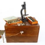 A Vintage microscope, and several cases of slides, including many floral, pollen and insect related,
