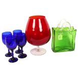 A set of 4 Bristol blue wine goblets, 18cm, a green glass basket, and a large Brandy balloon