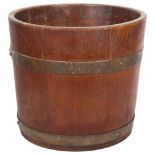 R A Lister & Company Ltd, a coopered oak planter, with label, diameter 31cm, height 27.5cm