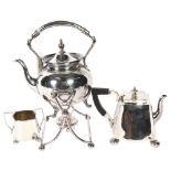 A silver plated spirit kettle on stand with burner, an Art Deco style teapot and matching sugar bowl