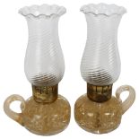 A pair of heavy gilded bubble glass candle lanterns, with spiral twist shades, height 29cm