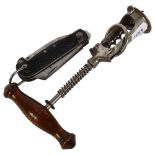An Antique corkscrew with turned wood handle, 16.5cm, and a multi-purpose pocket knife